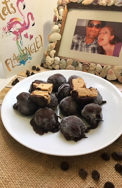 frozen peanut butter banana dark chocolate truffles on white plate with pictures of flamingo card and Lindsey Pine in bakcground