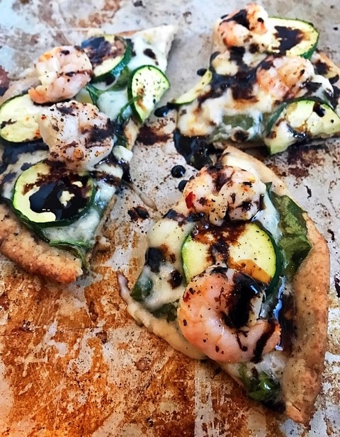 Mediterranean shrimp and zucchini pita pizza with balsamic glaze