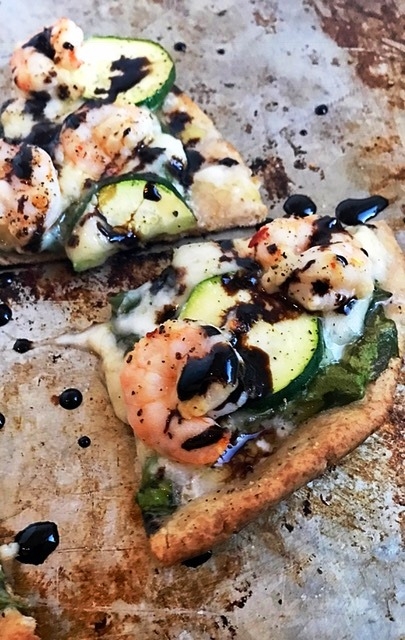 Mediterranean shrimp and zucchini pita pizza with balsamic glaze 
