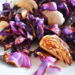 close up of roasted red cabbage and shallots with hard apple cider glaze