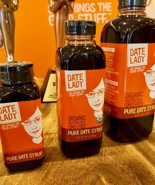 containers of date lady date syrup expo west 2019