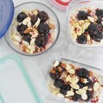 3 mismatched glass meal prep containers with cherry vanilla almond overnight oats