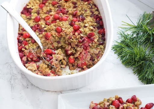 Cranberry Pomegranate Baked Oatmeal in white baking pan