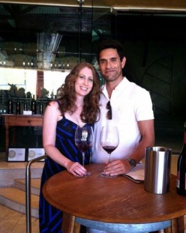 Lindsey Pine registered dietitian nutritionist and glass of red wine at Justin winery tasting room
