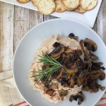 White Bean Hummus with Warm Garlic Rosemary Mushrooms with a plate of crackers