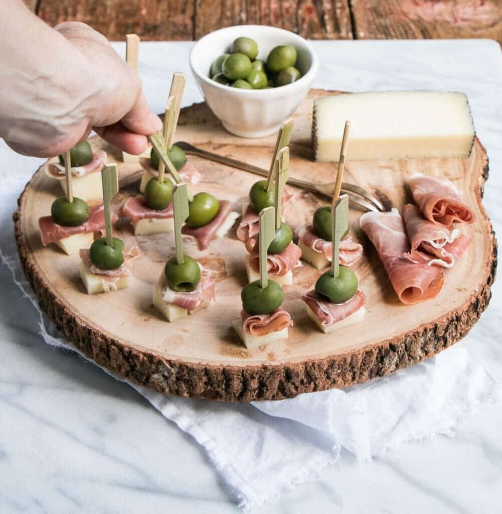 manchego cheese, ham, and green olive toothpick bites