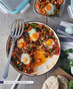 skillet with kale, pepper, and chickpea shakshuka