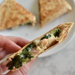 close up of inside of a white bean, spinach and sundried tomato quesadilla
